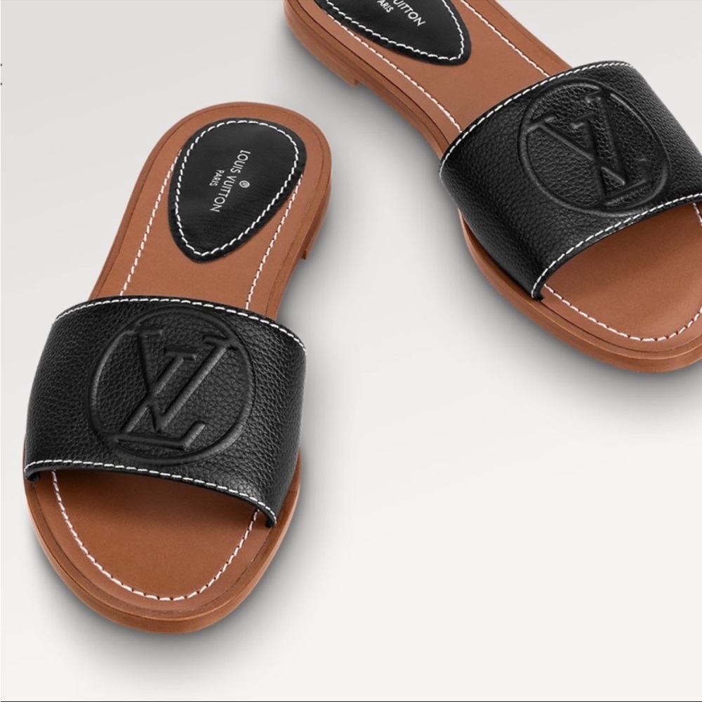 Authentic Louis Vuitton black “lock it” flat mule